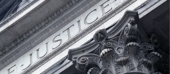 Justice carved into court house